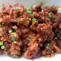 Gobi Manchurian · Cauliflower florets stir fried with hot chilies, ginger, garlic and spring onion in a specia...