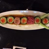 Ocean's Breeze Roll · Tuna, salmon, white fish, avocado wrapped with cucumber and topped with ponzu sauce.