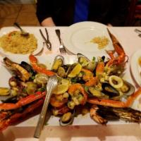 Mix of Grilled Seafood · Parrilhada de Mariscos. Grilled snow crab legs, prawns, lobster, baby octopus, clams, mussel...