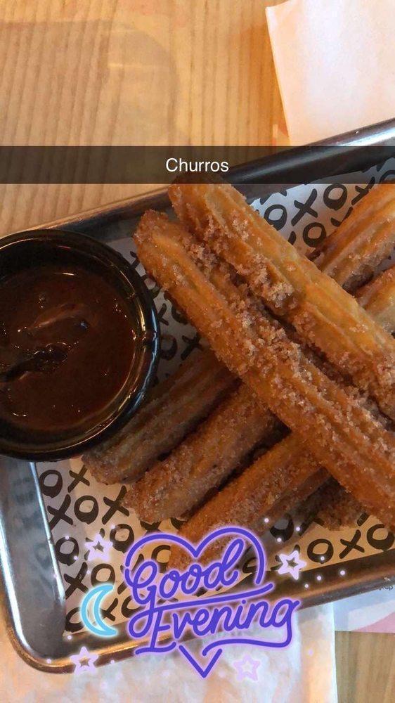Churros · Sugar dusted and served with Mexican hot chocolate sauce.