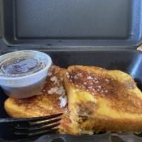 French Toast Breakfast · 3 slices of Texas toast topped with cinnamon and powered sugar.