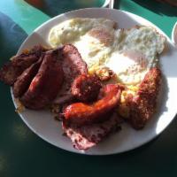 Irish Breakfast · 2 eggs, imported Irish bacon, sausage, white pudding. Served with home fries and toast.