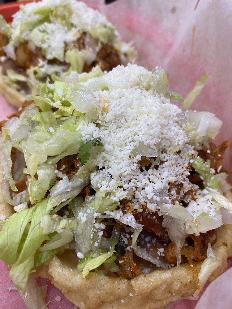 Sopes · Very delicious home made fried thick tortilla made of corn dough. Pick from any of our proteins, refried beans, Lettuce, onions, Queso Cotija(cheese), sour cream and green sauce on the side.