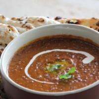 Dal Makhani · Creamy black lentils cooked with onions and tomatoes. Served with rice.