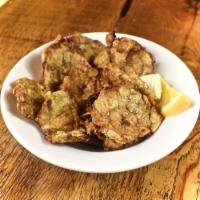 Tostones · Fried, crispy, salty, green plantains
