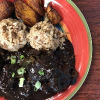 Oxtail · Served with rice, sweet plantains and red bell pepper