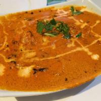 Chicken Tikka Masala · Chefs special. Boneless grilled chicken cooked with tomato, special spices and a touch of cr...