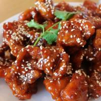 Peking Spareribs · Hand battered boneless pork ribs tossed in our sweet peking sauce