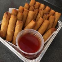 2 Pieces Thai Chicken Egg Rolls · Hand rolled fried crispy with chicken, noodles, and vegetables.