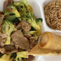 Beef with Broccoli · Tender beef with broccoli and carrots in a garlic brown sauce.