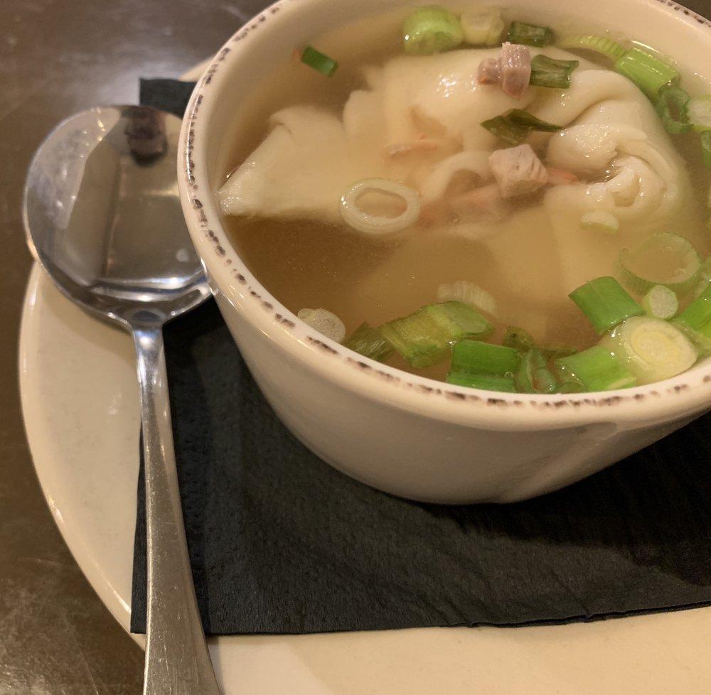 Wonton Soup · Seasoned pork wrapped in a wonton skin and served in a chicken broth with diced seared pork and scallions.