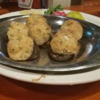 Stuffed Mushrooms · Topped with Hollandaise sauce.