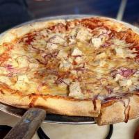 BBQ Chicken Pizza · BBQ sauce, roasted chicken, red onions, and smoked Gouda.