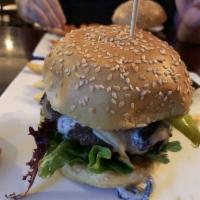 Blue Moon Burger · Angus beef aged with Blue Moon beer, Buttermilk Blue cheese, sauteed onions and mushrooms, o...