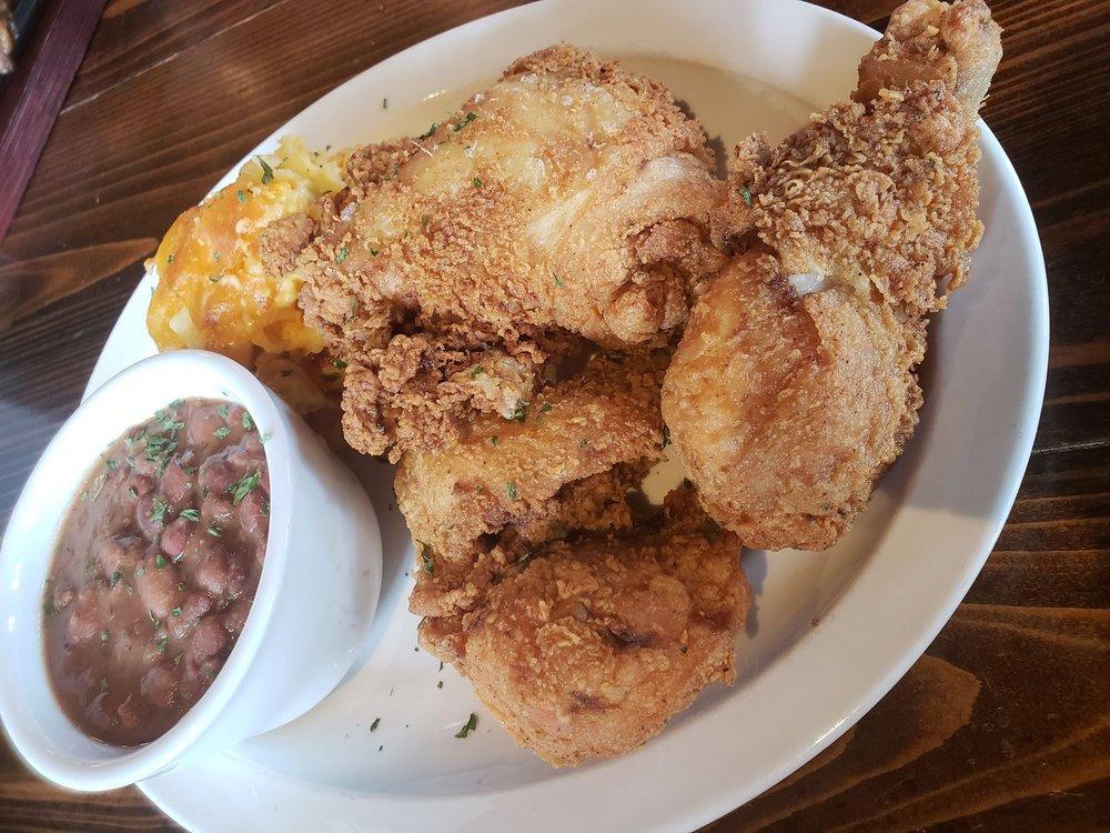 Morrow's Fried Chicken · Tender fried chicken marinated in our own house seasoning and cooked to juicy perfection served with choice of two sides (white or dark meat).