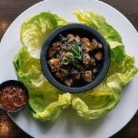 Lettuce Wraps · Korean style spicy chicken, leafy lettuce and special sauce for your assembly.
