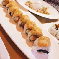Finding Nemo Roll · Tuna, salmon, and yellowtail roll topped with spicy scallop.