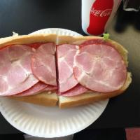 Italian Combo Sandwich · Pepperoni, salami, capicola, oil and vinegar, lettuce, tomato, provolone and dash of Italian...