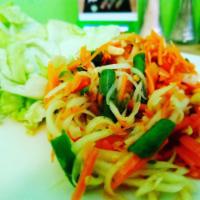 Papaya Salad · Papaya, carrot , tomato, green bean and peanut with Ying Thai salad sauce.