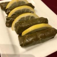 Dolma · Grape leaves stuffed with rice spices and seasonings.