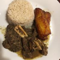 Curry Goat Stew · Steamed White Rice /Sweet Plantains or Cabbage