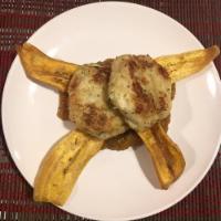 Maryland Crab Cakes · Mango chutney and fried plantain chips.