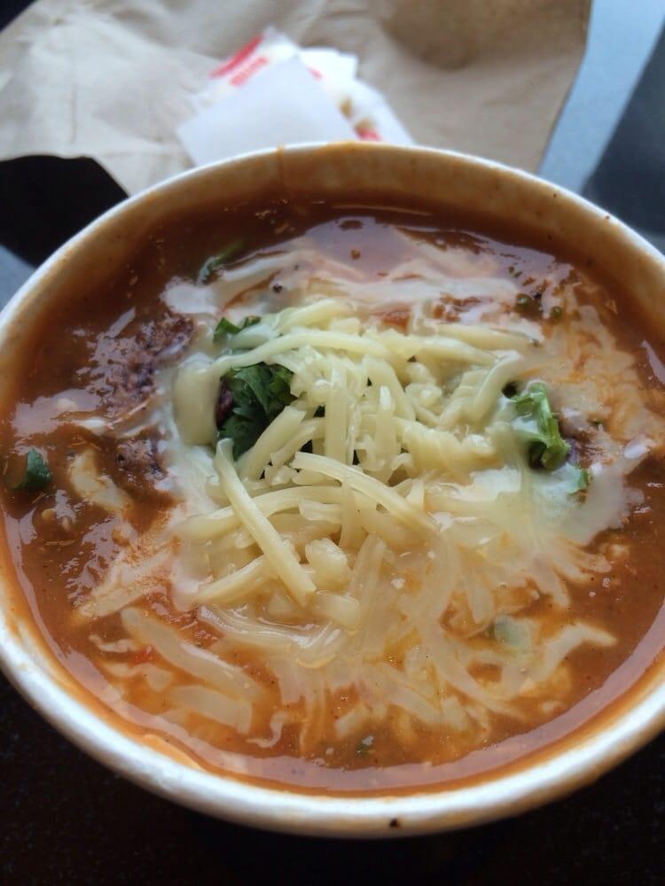 Mexican Chicken Tortilla Soup · A blend of grilled corn tortillas, oven-roasted tomatoes, red bell peppers and jalapenos Garnished with tortilla chips, Jack cheese and cilantro. Served with sourdough bread. Gluten-free. Dairy-free. Spicy. Low fat.