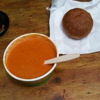 Organic Tomato Bisque · A luscious, silky, Organic tomato and sweet cream soup. Served with sourdough bread. Vegetar...