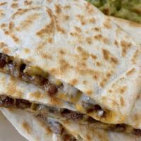 Quesadilla · Your choice of meat, cheese. Guacamole and sour cream on the side
