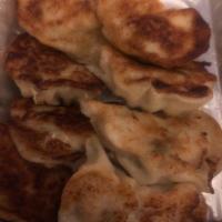 Pork & Chives Pan Fried Dumplings · 
