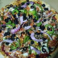 Garden Veggie Pizza · Red sauce, cheese, mushroom, bell peppers, red onions, diced tomatoes and black olives.
