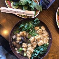 Vegan Pho · Broth simmered with Chinese mushrooms, onions and ginger
charred over an open flame and pan...