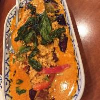 Purple Heart · Minced chicken in coconut milk red curry sauce with eggplant, bell peppers and Thai basil. M...
