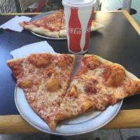 New York Cheese Pizza · Classic cheese pizza. Add toppings for an additional charge.