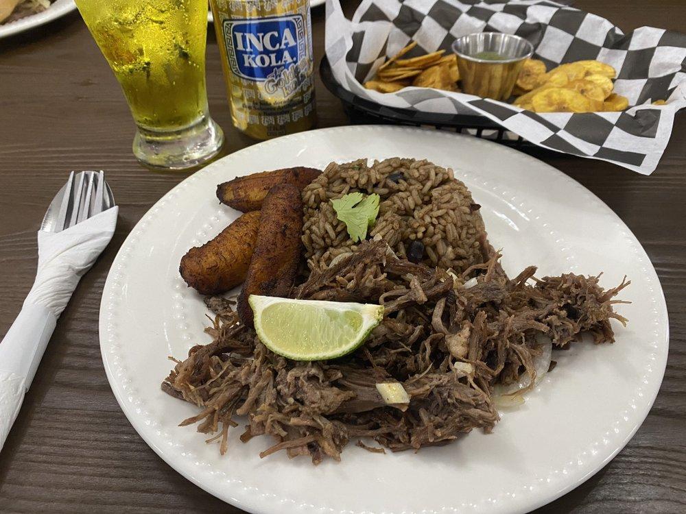 Vaca Frita · Pan-fried shredded skirt steak or chicken served with sauteed onions.