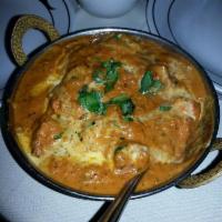 Tikka Masala · Cooked in a creamy spiced tomato sauce.