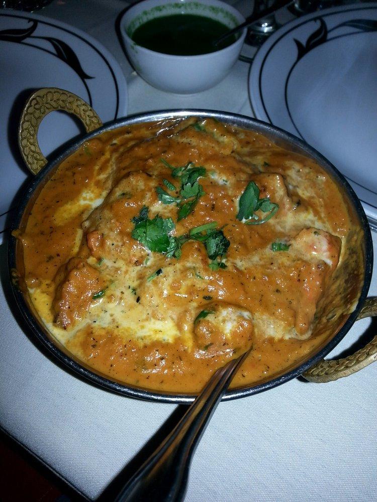 Tikka Masala · Cooked in a creamy spiced tomato sauce.