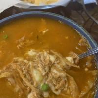 Tortilla Soup · Chicken broth with rice and chicken chunks, pico de gallo, fried tortilla strips, and shredd...