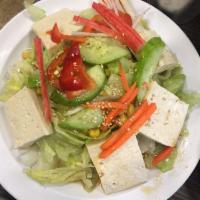 Tofu Salad · Tofu, lettuce and assorted vegetables served with special dressing.