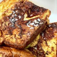 Hawaiian French Toast · Hawaiian sweet french toast sprinkled with cinnamon & powdered sugar.