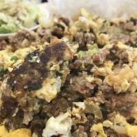 Portuguese Sausage Mix · Our homemade Portuguese sausage, green and white onion, scrambled together with eggs, served...