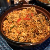 Lamb Biryani · Flavored basmati rice, whole spices and garden herbs.
