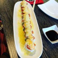 Godzilla Roll · Shrimp tempura, crab mix, avocado, topped with spicy tuna, spicy and wasabi aioli and tempur...