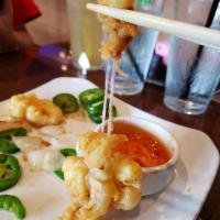 Fried Calamari · Crispy, breaded squid with jalapeno, onion, seasoned with salt and pepper.