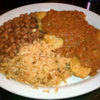 Pork Tamale Dinner · Three tamales smothered in chili con carne. Served with rice and whole beans.