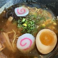Shoyu Ramen · Soy sauce flavor with chashu, 1/2 egg, fish cake, scallion, corn, bamboo shoot, wood ear and...