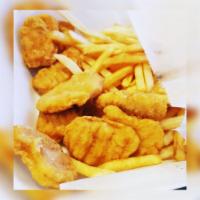 6 Piece Chicken Nuggets · Served with french fries and soda.