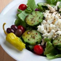Greek Salad · Tomatoes, cucumbers, onions, green peppers, Kalamata olives, pepperoncini, feta, oil and vin...