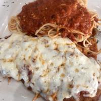 Chicken Parmigiana · Thin chicken breast breaded, fried, topped with mozzarella, Parmesan cheese and
marinara sau...