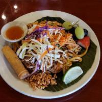 Pad Thai · Traditional thin rice noodle stir fried with chicken, fried tofu, scallion, bean sprout, egg...